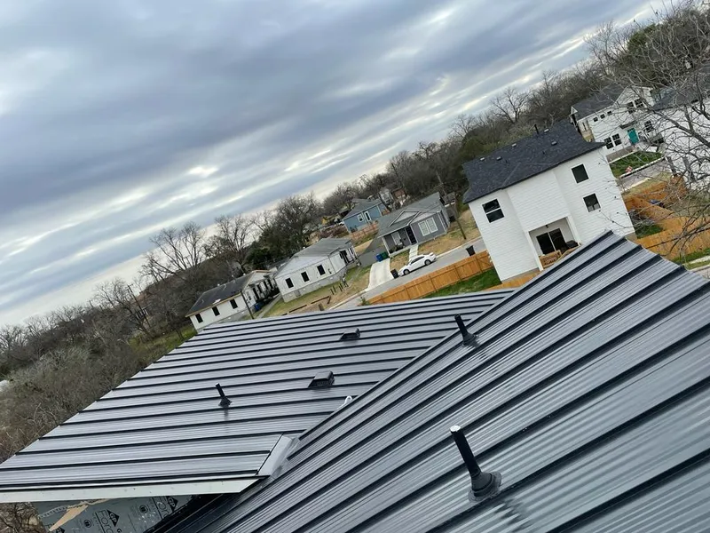 Standing seam metal roof panels with vents for Skylight Repair in Harper Woods